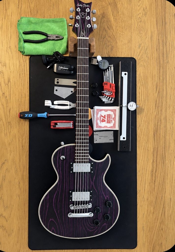 Harley Benton six-string guitar converted to an octave-down baritone on the RG Guitar Tech workbench in Nottingham.