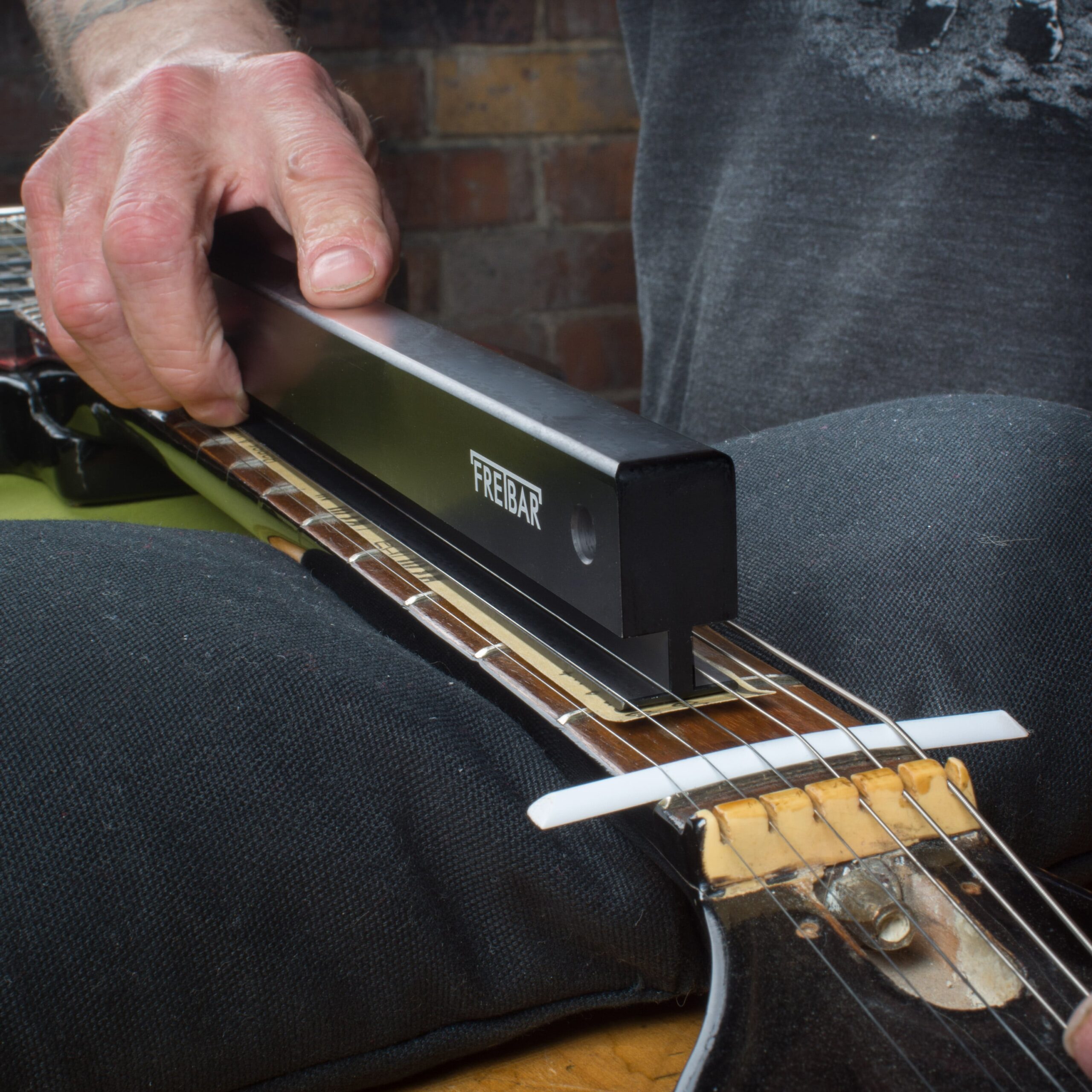 StewMac Fretbar leveling guitar frets under real string tension
