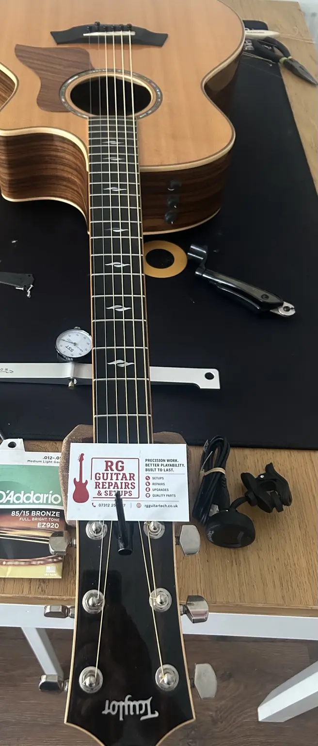 Taylor acoustic guitar undergoing a professional setup in Nottingham